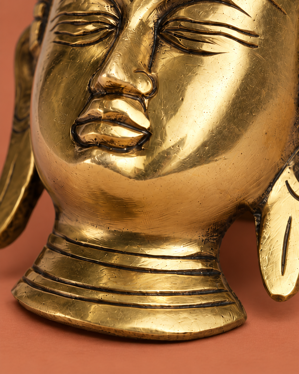 Brass Buddha Face Wall Hanging — Finish detail