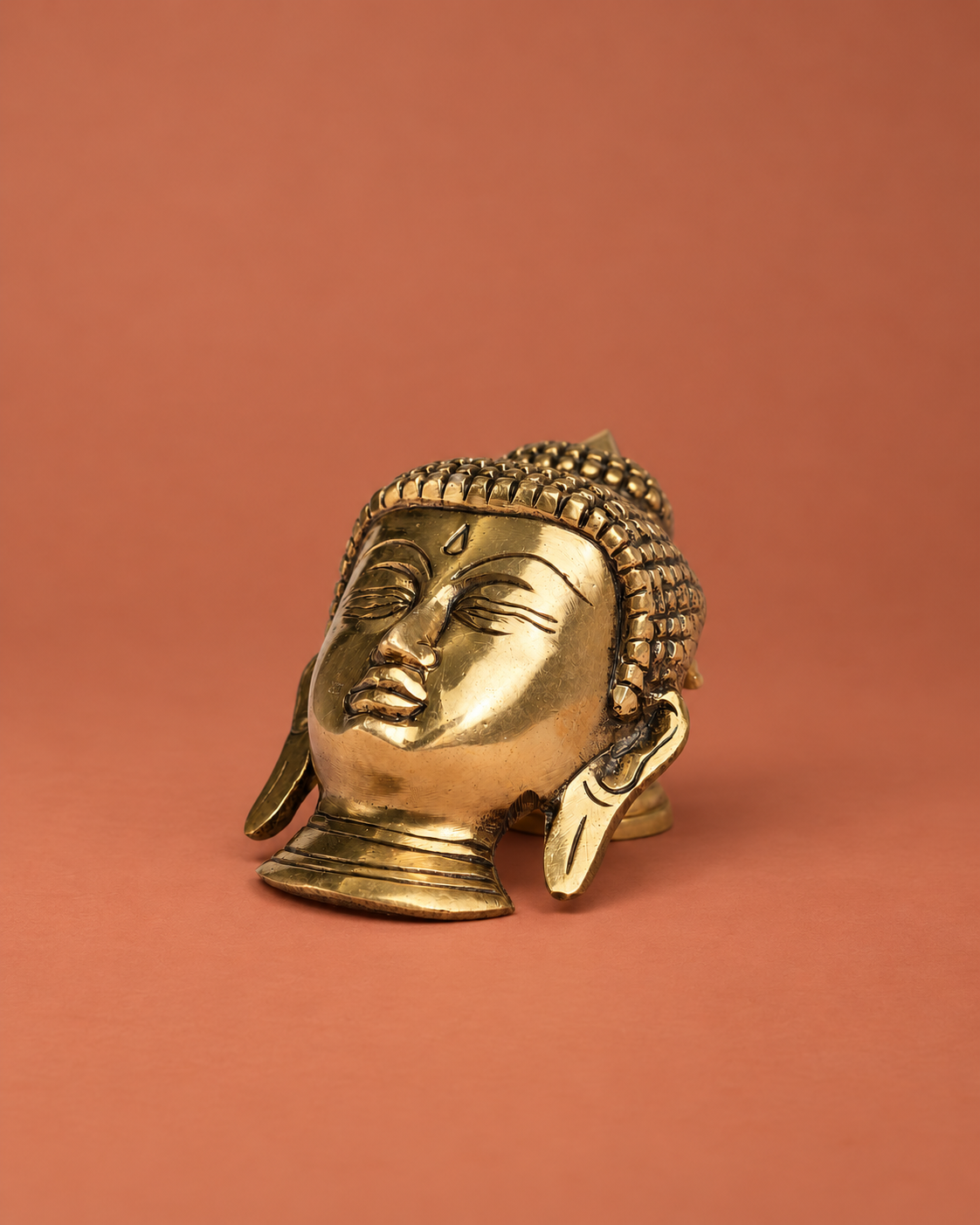 Brass Buddha Face Wall Hanging — Wider hero