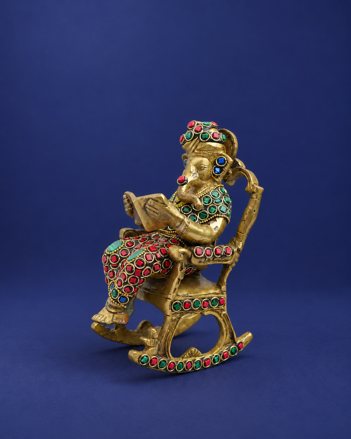 Brass Ganesha Reading on Recliner with Inlay Work — Wider hero