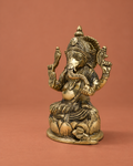 Brass Chaturbhuj Ganesha on Lotus Base — Three-quarter hero